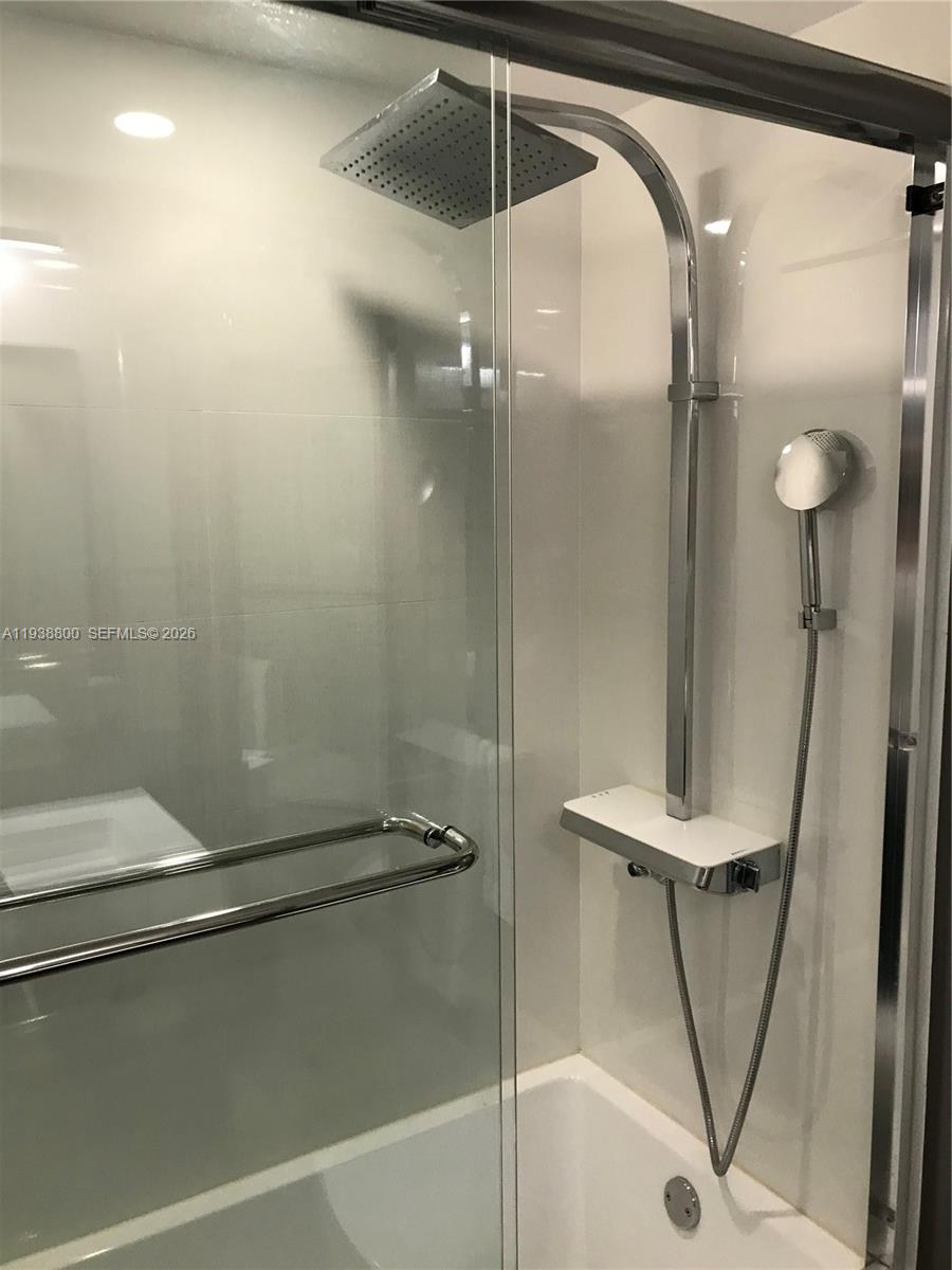 100 Lincoln Road, Unit 314B Miami Beach, FL 33139 - Photo 33 of 44 a bathroom with a shower and a sink