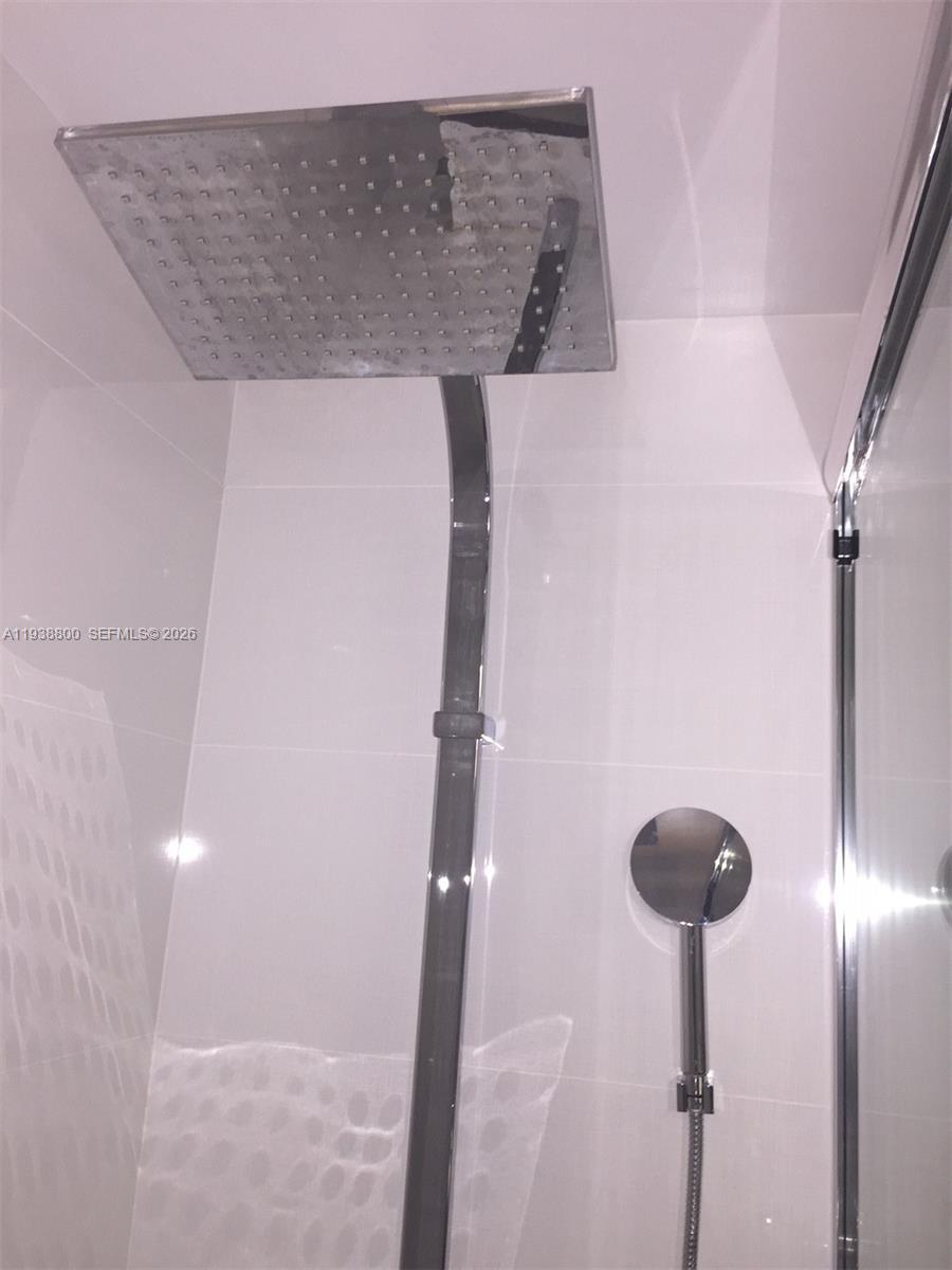 100 Lincoln Road, Unit 314B Miami Beach, FL 33139 - Photo 34 of 44 a close view of shower