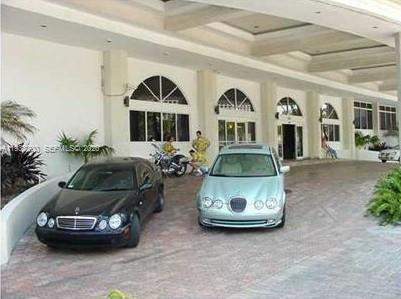 100 Lincoln Road, Unit 314B Miami Beach, FL 33139 - Photo 42 of 44 a front view of a house with parking space