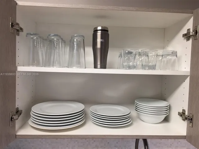 a bathroom with a toilet a sink and view