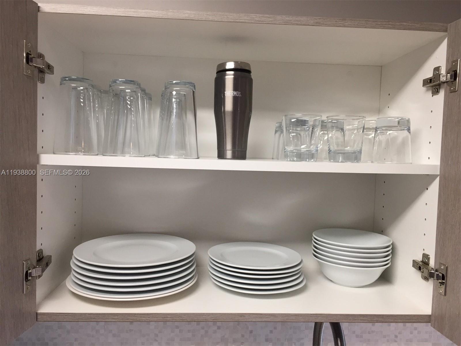 100 Lincoln Road, Unit 314B Miami Beach, FL 33139 - Photo 10 of 43 a bathroom with a toilet a sink and view