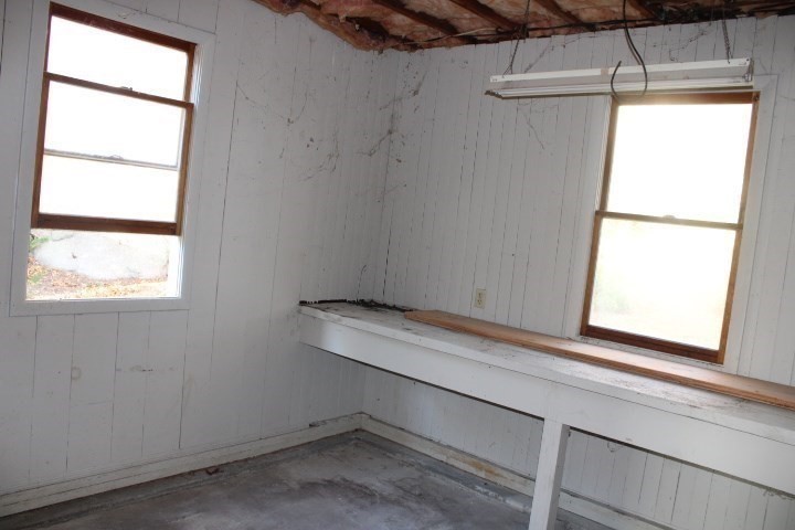 34 R Summer Street Rockport, MA 01966 - Photo 14 of 22 a view of an empty room with a window