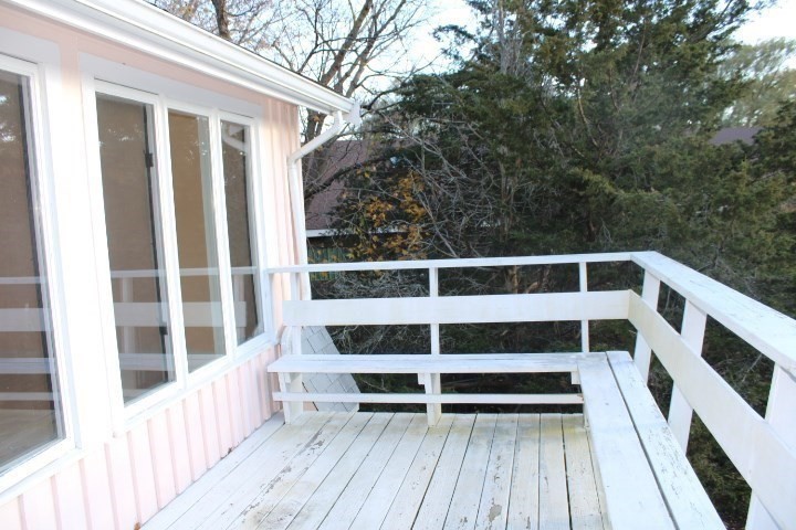 34 R Summer Street Rockport, MA 01966 - Photo 15 of 22 a view of balcony with wooden floor and fence