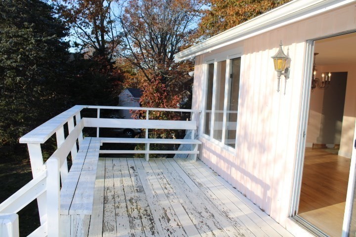 34 R Summer Street Rockport, MA 01966 - Photo 16 of 22 a view of balcony with wooden floor and fence