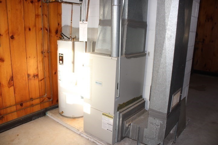 34 R Summer Street Rockport, MA 01966 - Photo 20 of 22 a bathroom with a glass shower door and a sink