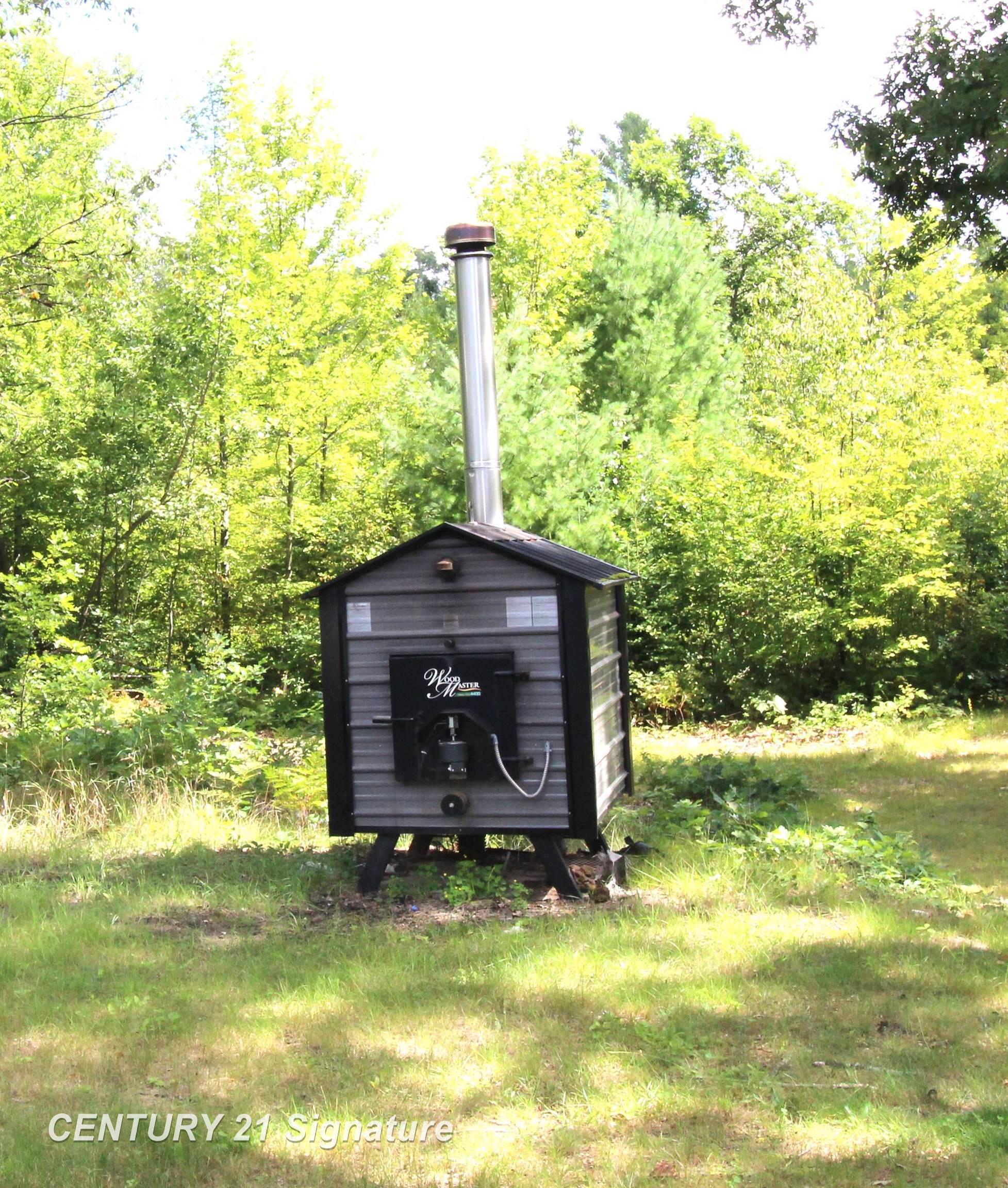 6595 Wickert Road Hale, MI 48739 - Photo 17 of 23 Wood Burner