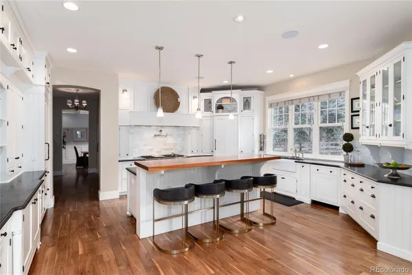 a living room with furniture or couch and a dining table
