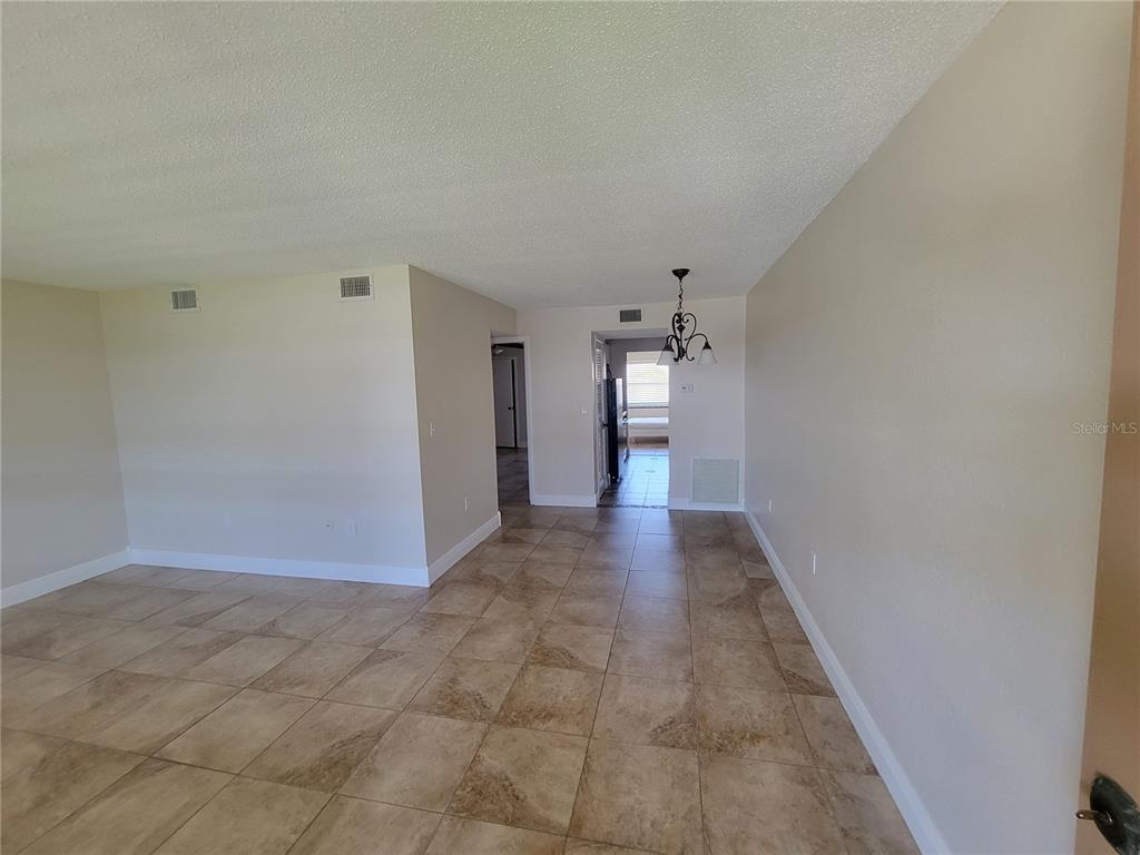 10032 65th Avenue North, Unit 19 St. Petersburg, FL 33708 - Photo 11 of 44 a view of entryway