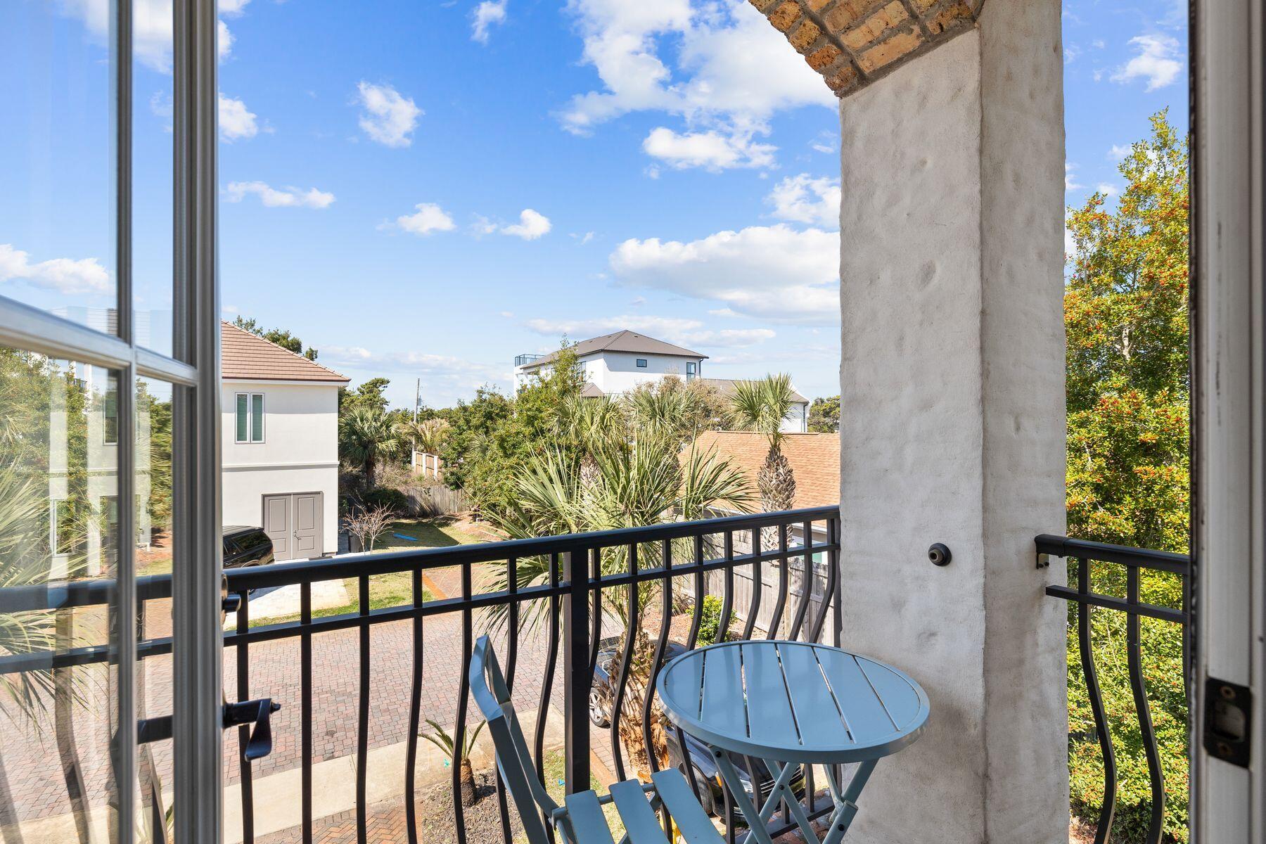 52 Le Soleil Drive Miramar Beach, FL 32550 - Photo 16 of 31 a view of a balcony with chair and table