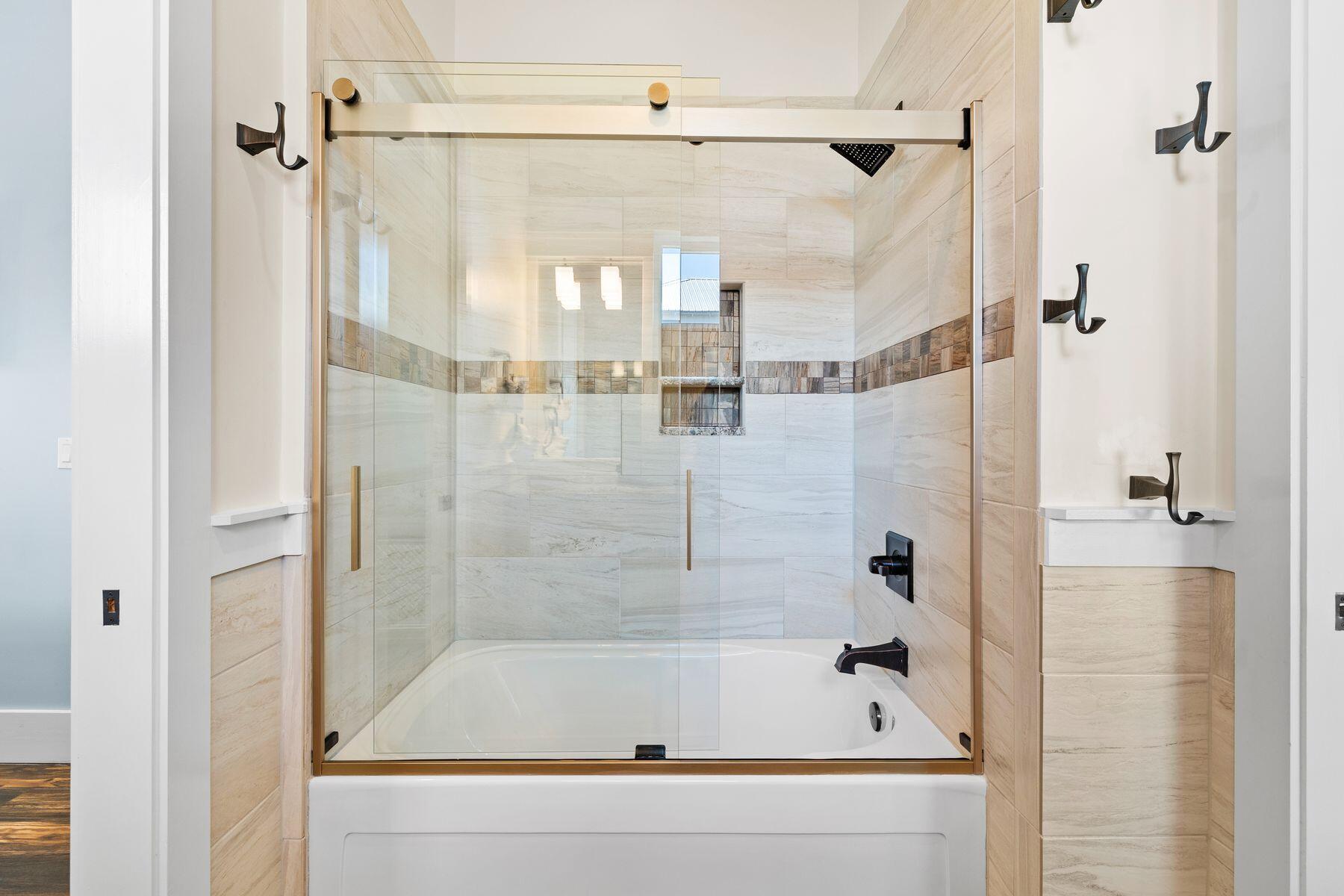 52 Le Soleil Drive Miramar Beach, FL 32550 - Photo 25 of 31 a bathroom with a bathtub and a shower