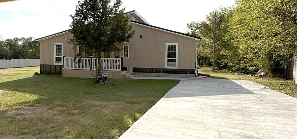 a view of a backyard with a garden