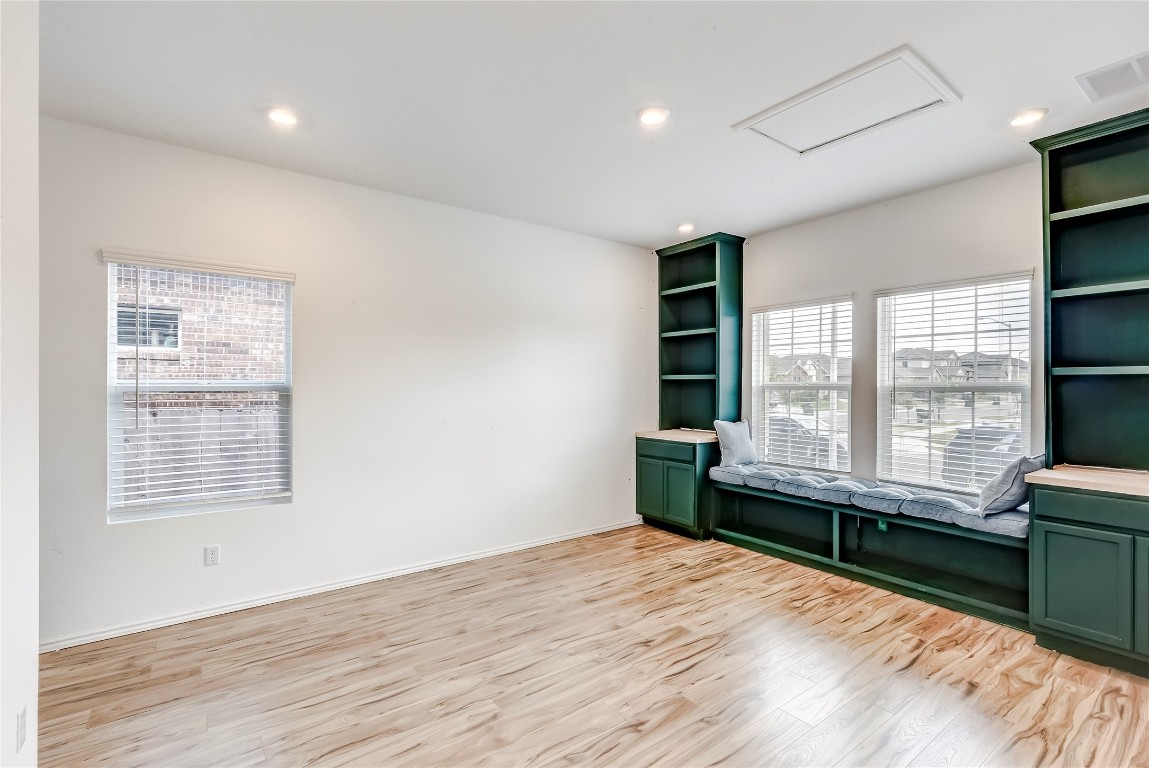 2113 Guntersville Bend Leander, TX 78641 - Photo 23 of 40 a room with a bed and large windows