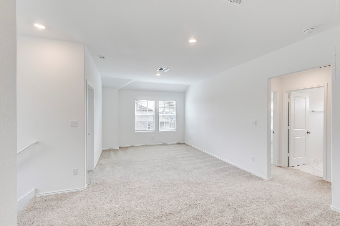 2113 Guntersville Bend Leander, TX 78641 - Photo 25 of 40 an empty room with windows
