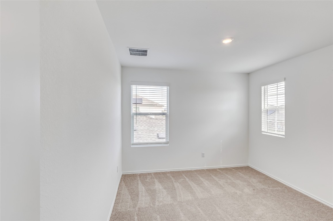 2113 Guntersville Bend Leander, TX 78641 - Photo 27 of 40 an empty room with windows