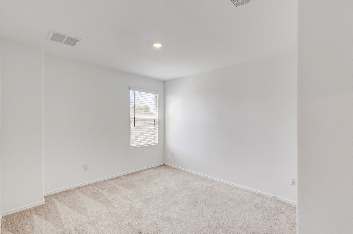 2113 Guntersville Bend Leander, TX 78641 - Photo 31 of 40 a view of an empty room with a window