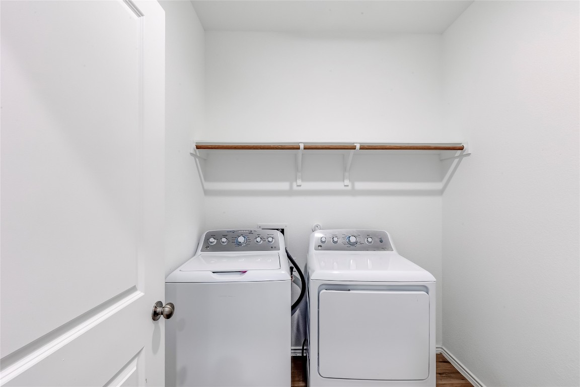 2113 Guntersville Bend Leander, TX 78641 - Photo 32 of 40 a utility room with dryer and washer