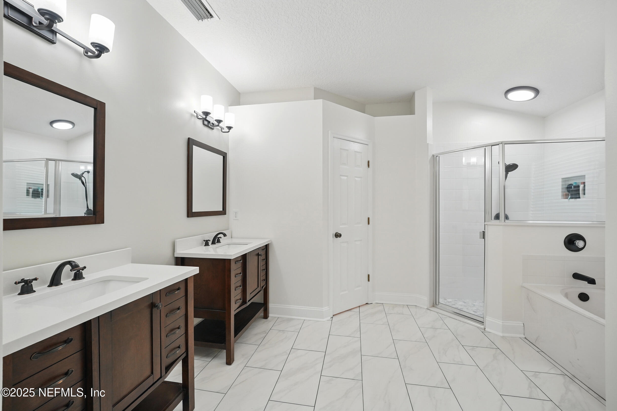 87529 Creekside Drive Yulee, FL 32097 - Photo 20 of 42 primary bathroom