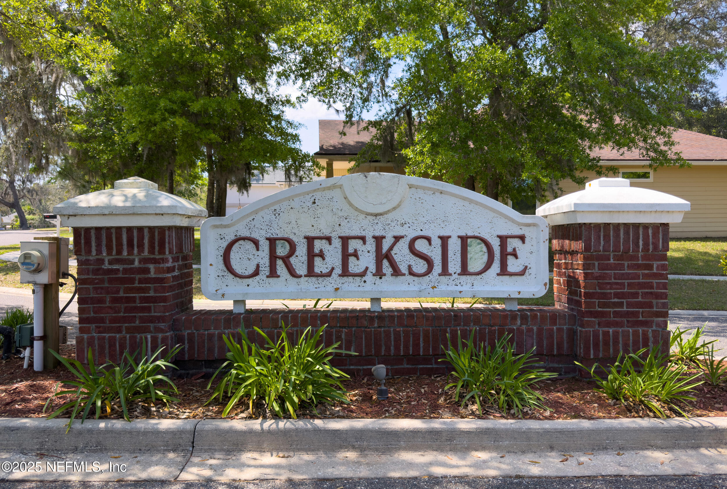 87529 Creekside Drive Yulee, FL 32097 - Photo 2 of 42 neighborhood entrance