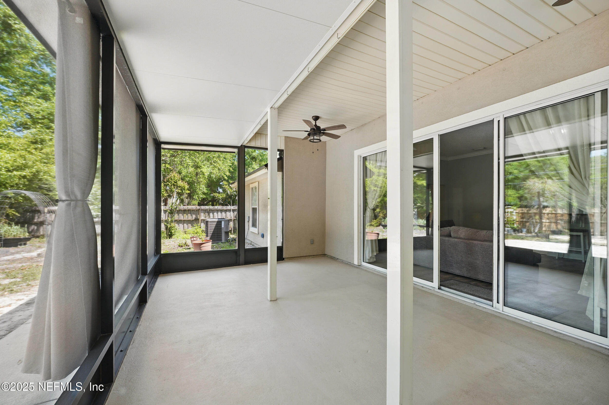 87529 Creekside Drive Yulee, FL 32097 - Photo 3 of 42 screened in lanai