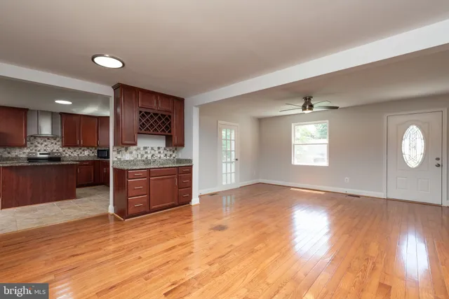 a view of kitchen with window and wooden floor