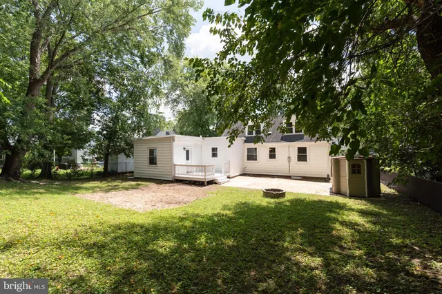 a house view with a sitting space and garden