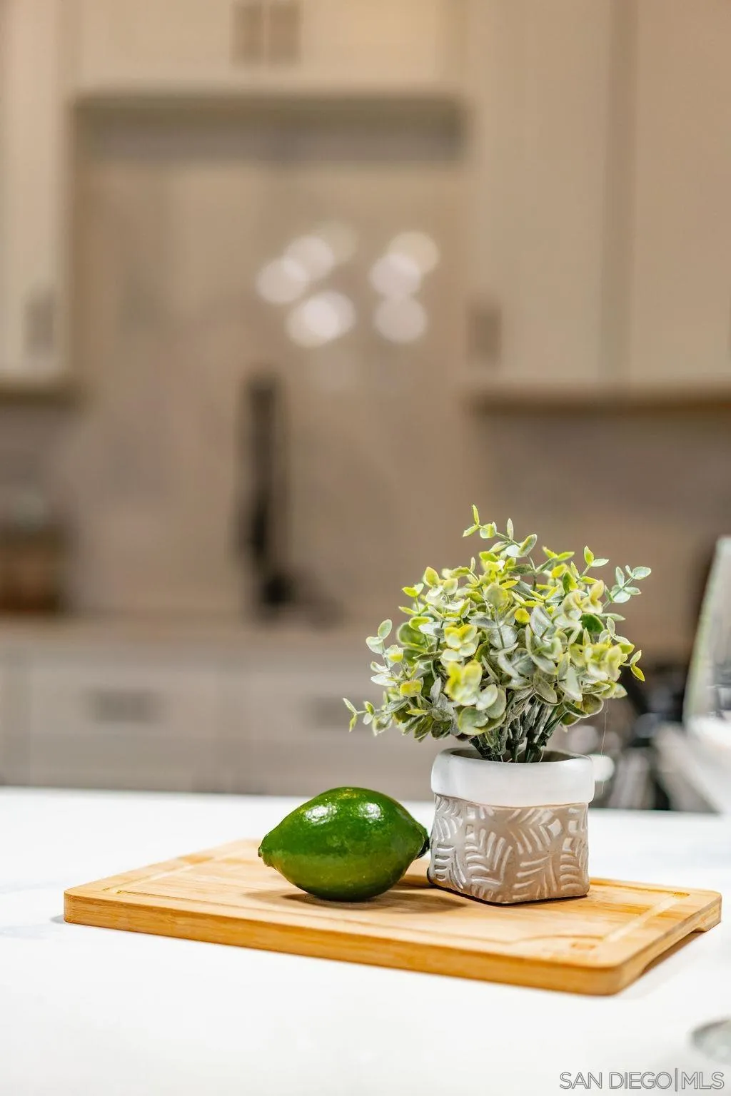 1298 Prospect Street, Unit 2F La Jolla, CA 92037 - Photo 37 of 54 a view of a glass vase with flowers in it