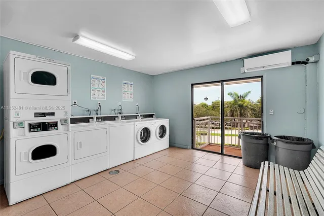 a kitchen with a stove a refrigerator and a stove