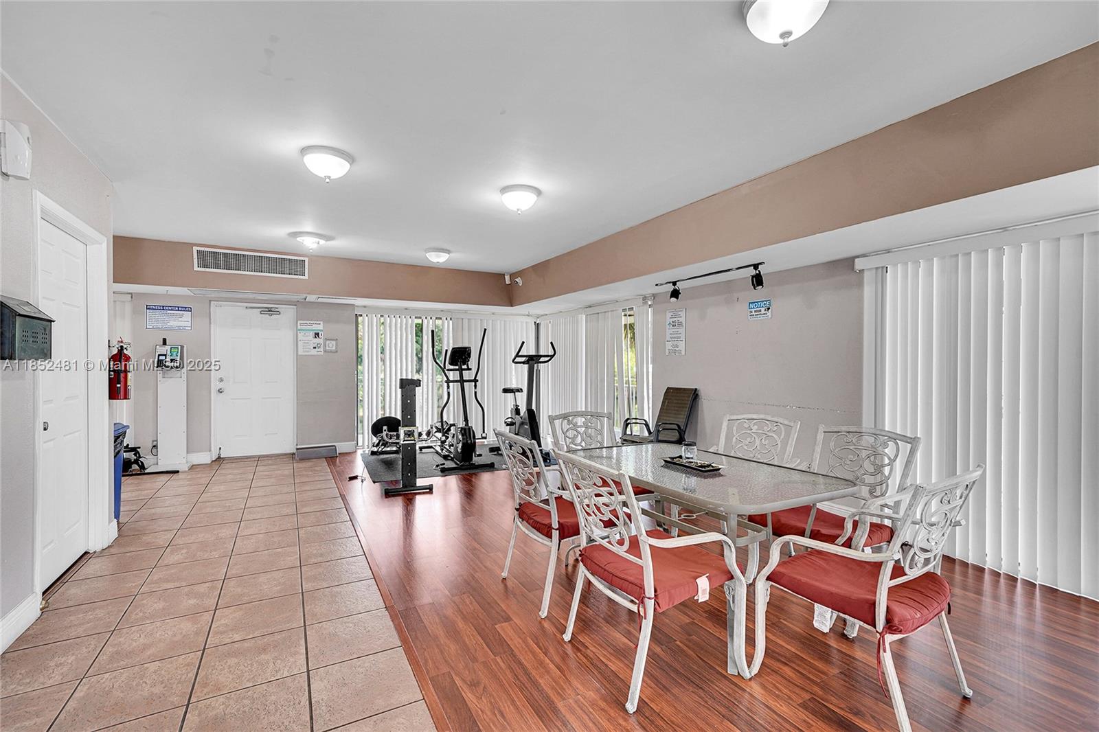 405 South Pine Island Road, Unit 403D Plantation, FL 33324 - Photo 16 of 20 a view of a dining room with furniture and wooden floor