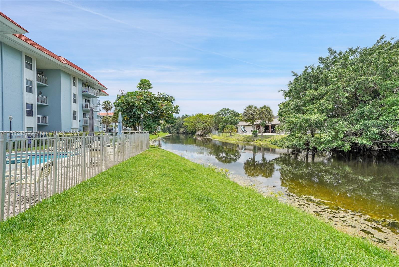 405 South Pine Island Road, Unit 403D Plantation, FL 33324 - Photo 19 of 20 a view of swimming pool from a yard
