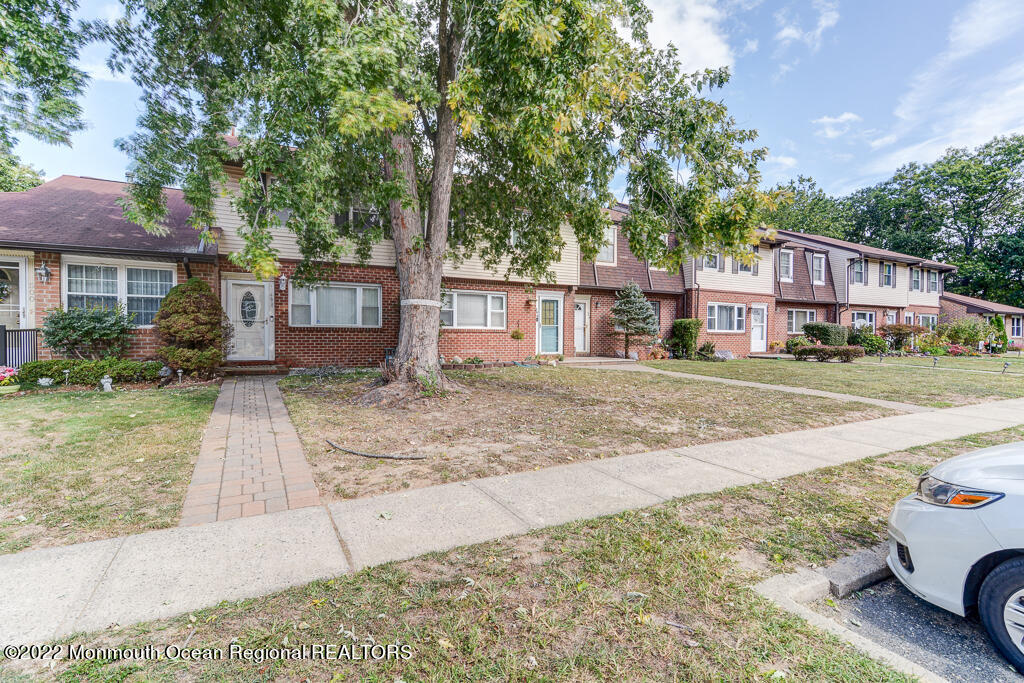 494 Rena Court Brick, NJ 08724 - Photo 2 of 18 a front view of a house with a yard