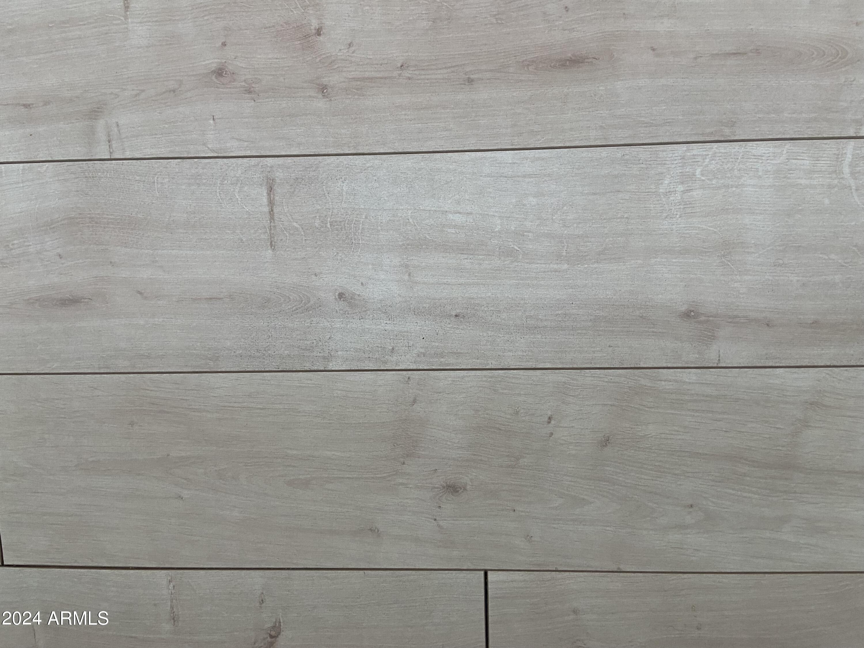 2066 West Klamath Avenue, Unit 66 Apache Junction, AZ 85119 - Photo 13 of 35 a bathroom with a white shower and a window of another room