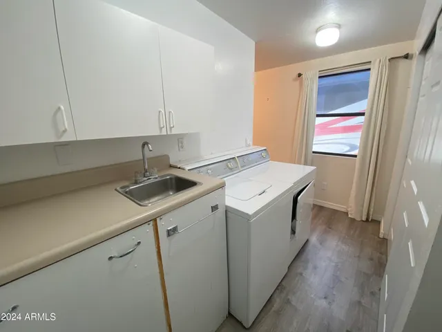 a bathroom with a toilet and a sink