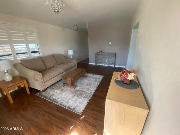 a living room with furniture and a couch