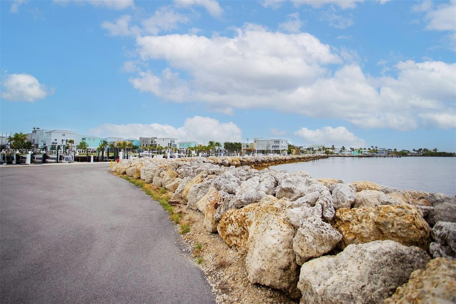 94825 Overseas Highway, Unit 172 Key Largo, FL 33037 - Photo 35 of 40 a view of a city and ocean
