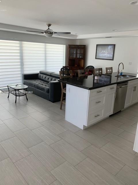 94825 Overseas Highway, Unit 172 Key Largo, FL 33037 - Photo 7 of 40 a living room with furniture and a large window
