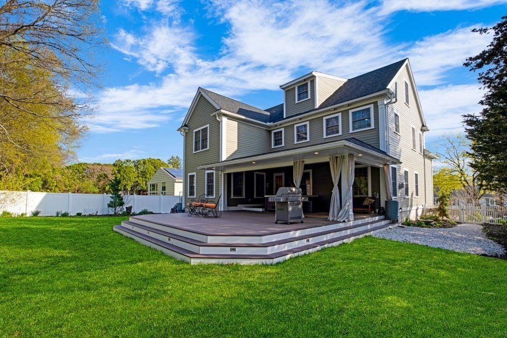 36 Stanley Road Newton, MA 02468 - Photo 1 of 1 a front view of a house with garden and sitting area