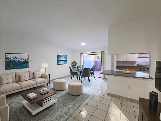 a living room with furniture and a couch