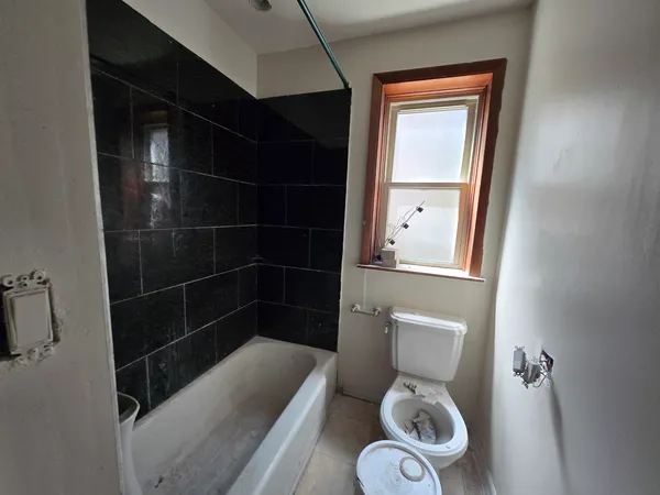 a view of empty room with front door