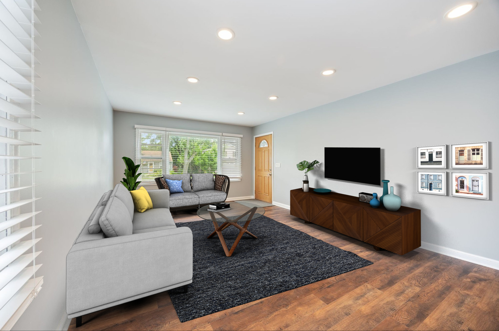 149 Wheeling Avenue Wheeling, IL 60090 - Photo 3 of 23 a living room with furniture and a flat screen tv