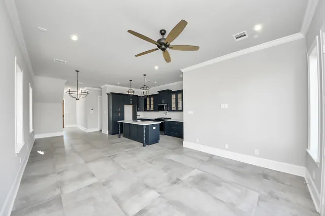 a view of a kitchen with a sink and cabinet area