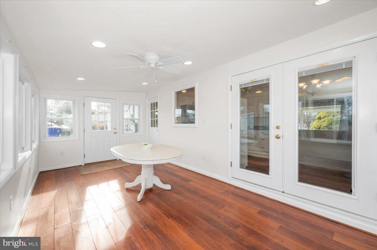 1200 Wilson Place Frederick, MD 21702 - Photo 20 of 57 a view of an empty room with wooden floor and a window