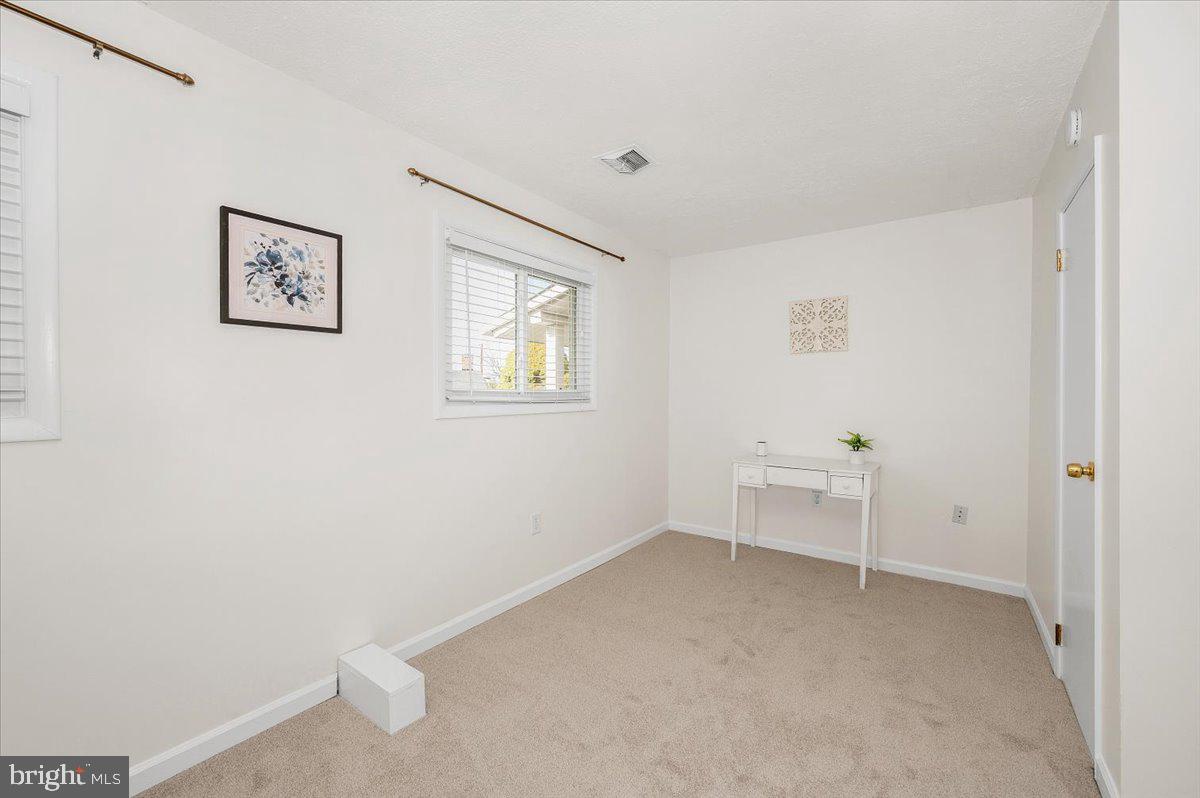 1200 Wilson Place Frederick, MD 21702 - Photo 27 of 57 a view of room with window and cabinet