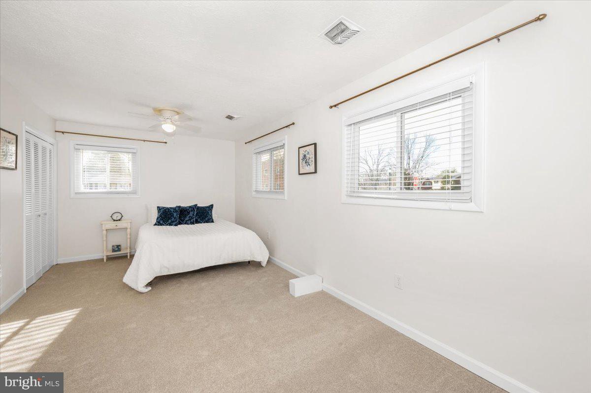 1200 Wilson Place Frederick, MD 21702 - Photo 28 of 57 a bedroom with a bed and a night stand