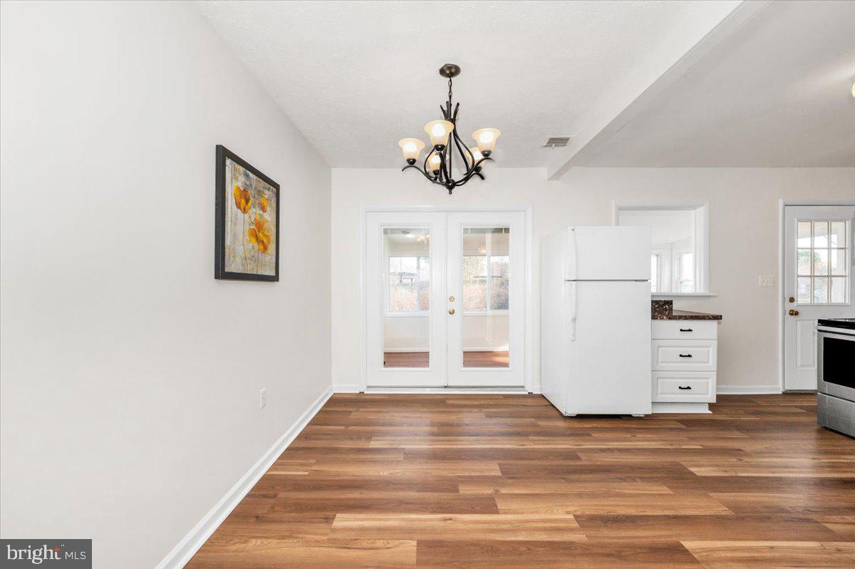 1200 Wilson Place Frederick, MD 21702 - Photo 6 of 57 a view of a livingroom with a furniture wooden floor and windows