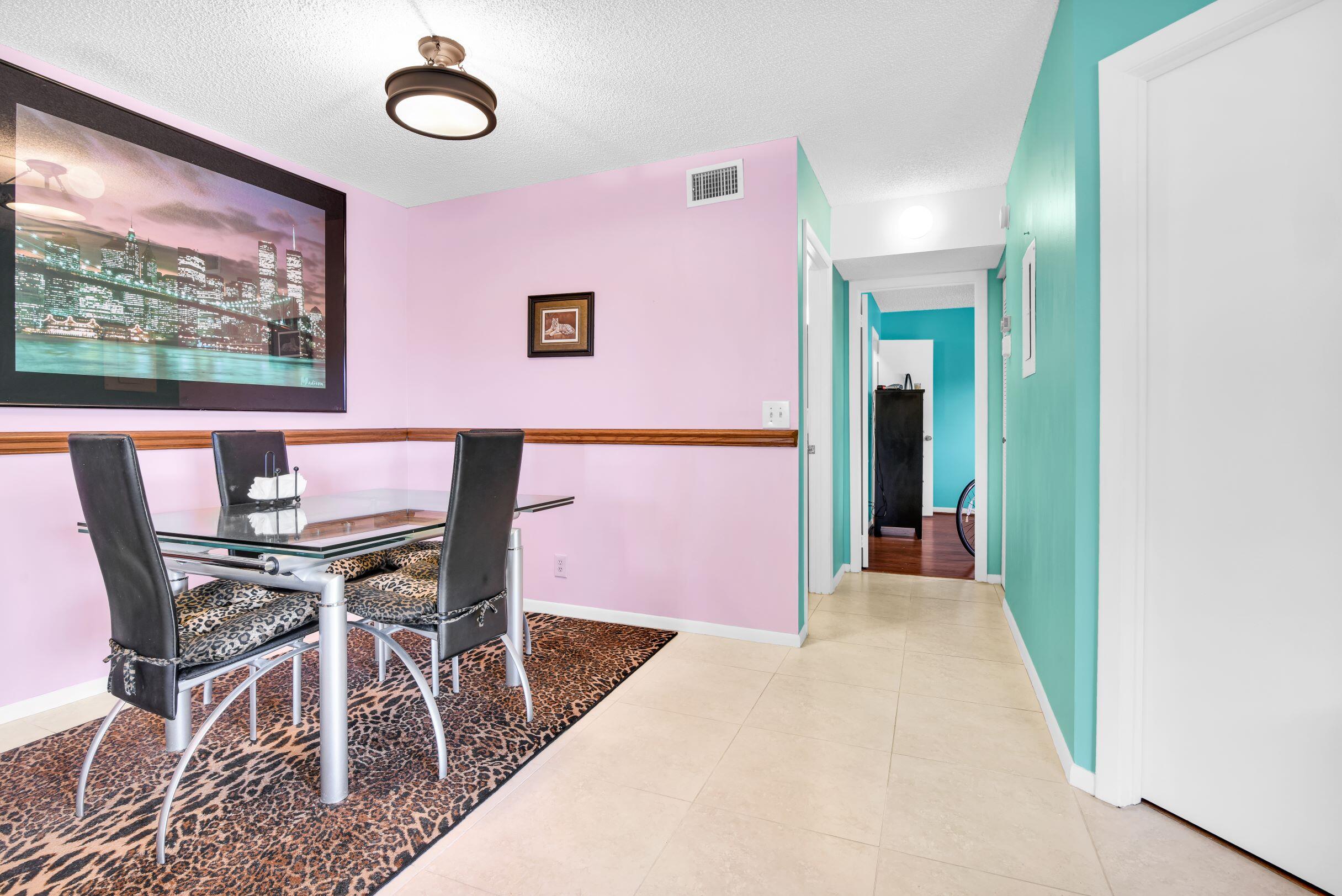 545 Trace Circle, Unit 201 Deerfield Beach, FL 33441 - Photo 11 of 37 View of Dining and Hallway from foyer