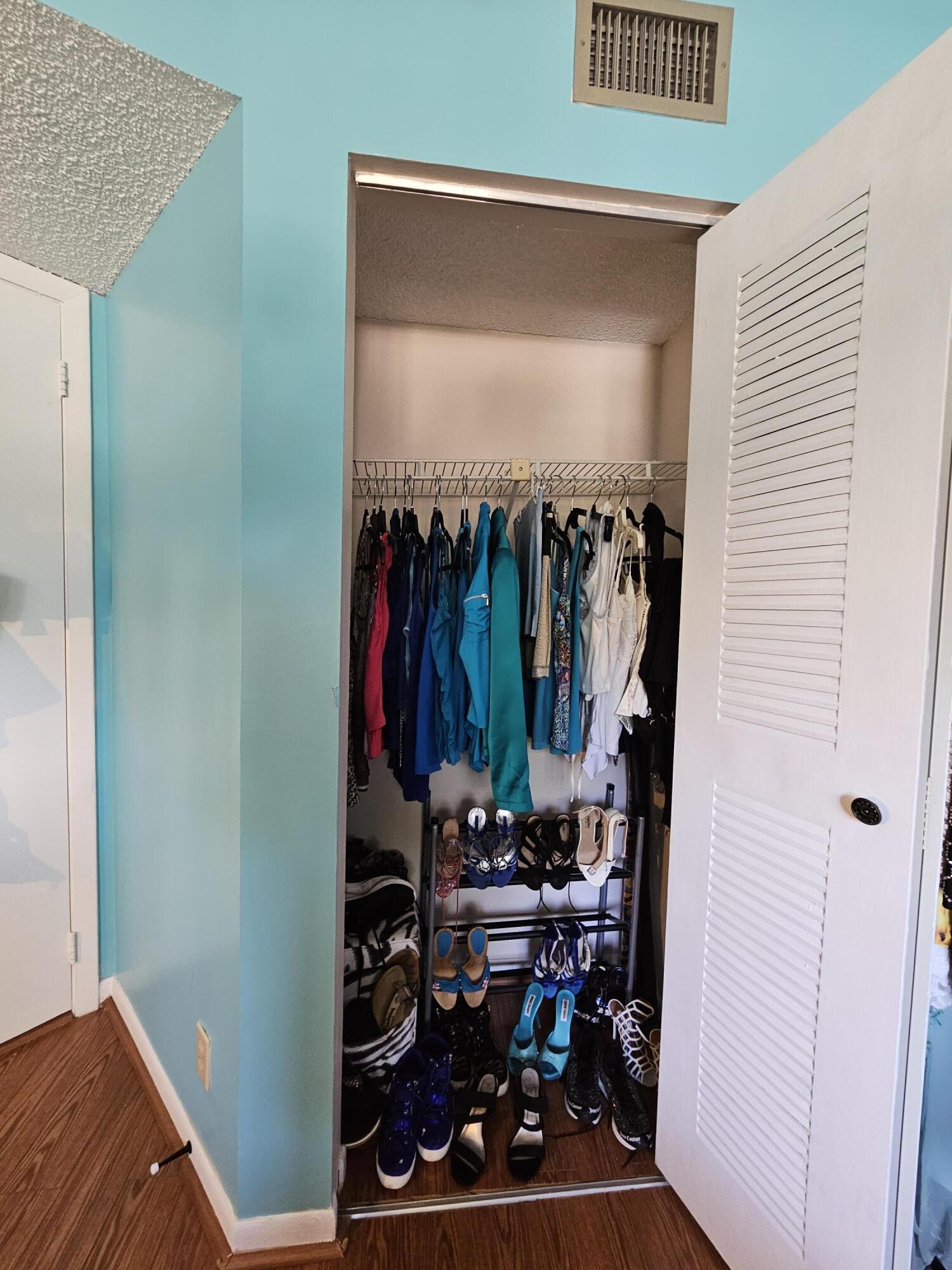 545 Trace Circle, Unit 201 Deerfield Beach, FL 33441 - Photo 19 of 37 Second Bedroom Closet