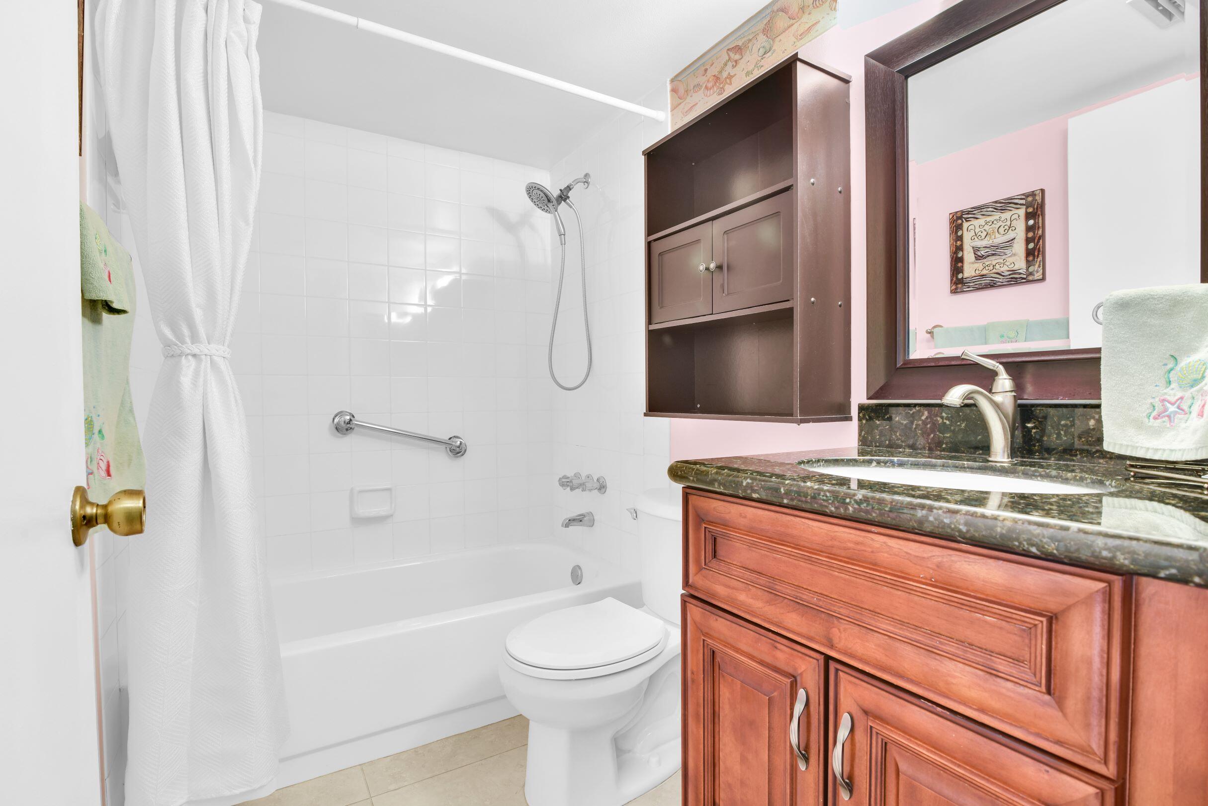 545 Trace Circle, Unit 201 Deerfield Beach, FL 33441 - Photo 20 of 37 Second Bath from Doorway