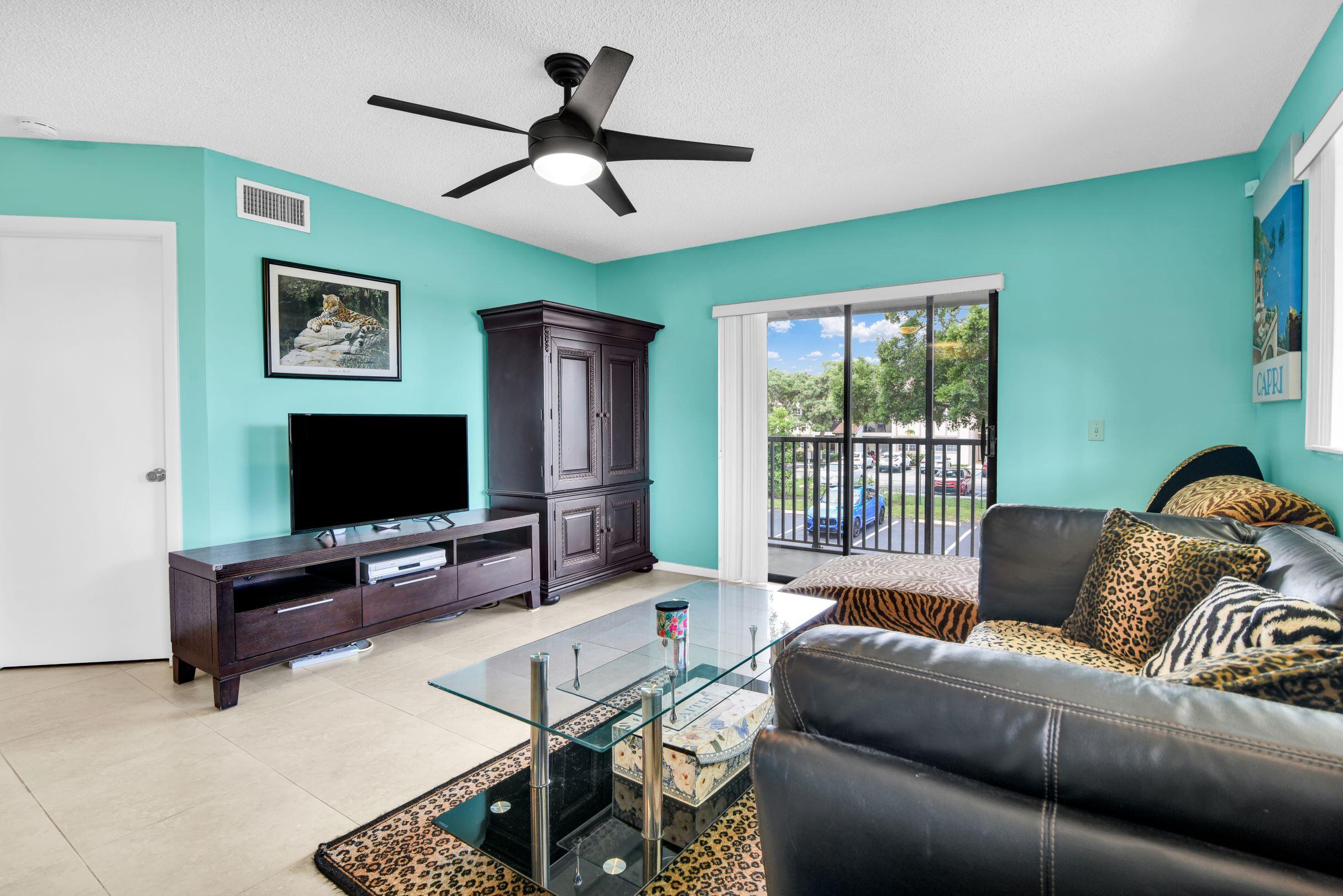 545 Trace Circle, Unit 201 Deerfield Beach, FL 33441 - Photo 2 of 37 View of Living from Foyer