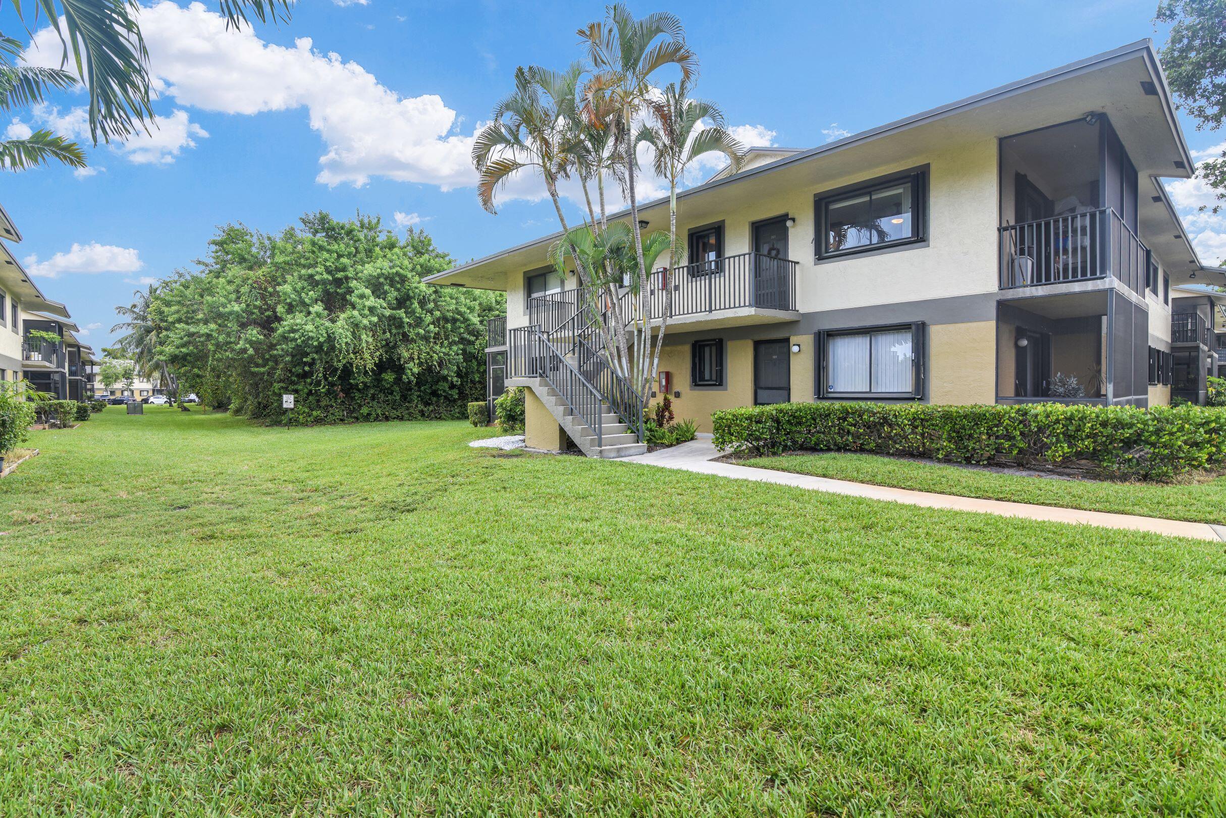 545 Trace Circle, Unit 201 Deerfield Beach, FL 33441 - Photo 24 of 37 Front of Building View