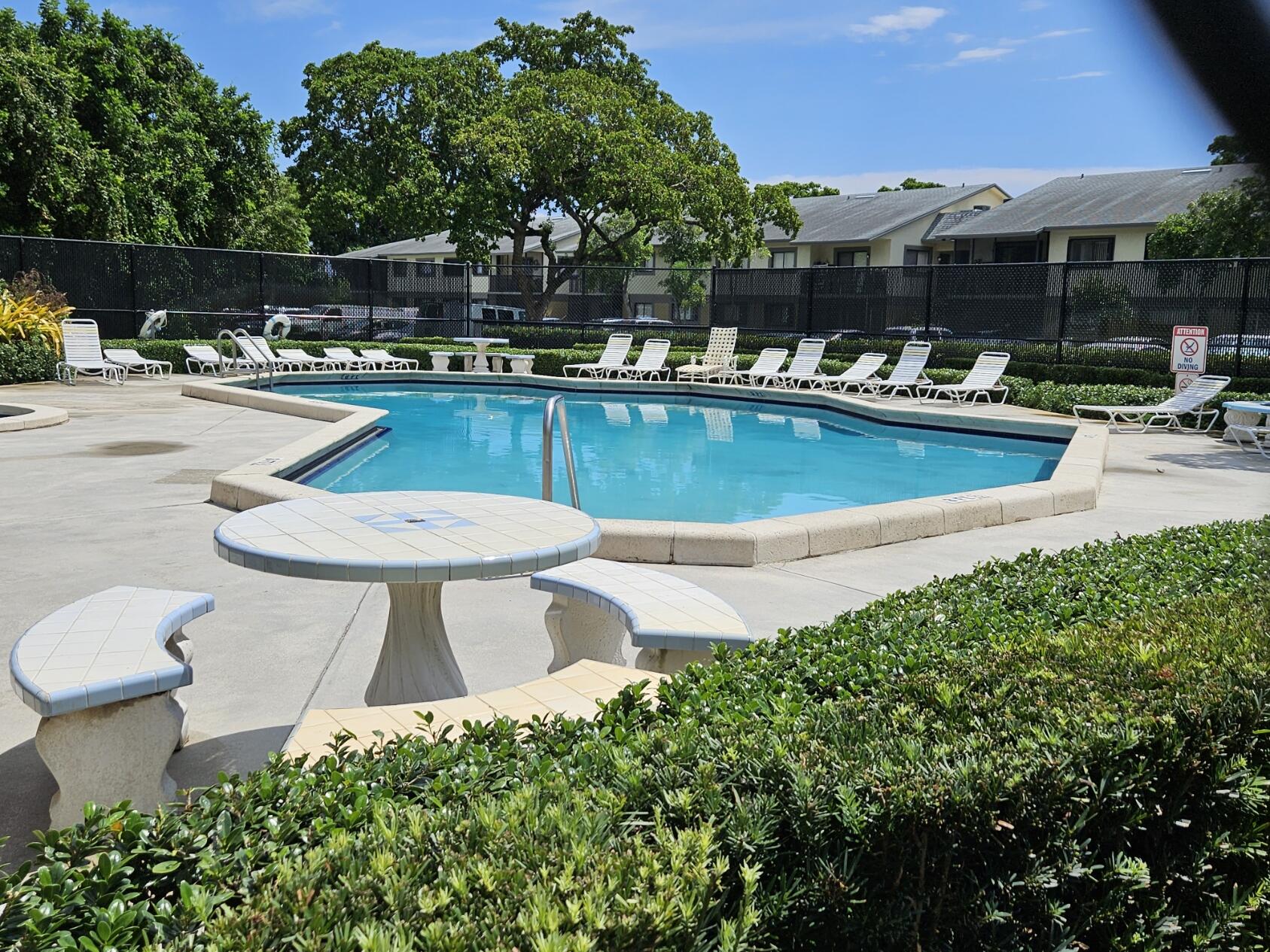 545 Trace Circle, Unit 201 Deerfield Beach, FL 33441 - Photo 32 of 37 TT Pool from Northwest